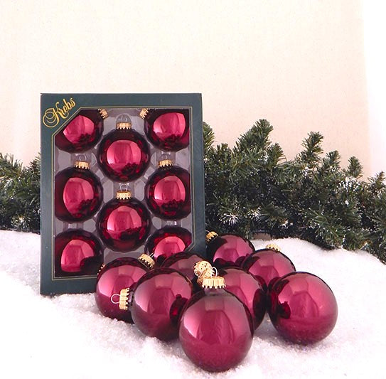 Burgundy And Silver Decorations On A Large Christmas Tree Stock